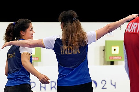 Manu Bhaker celebrates with her coach